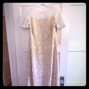 Wedding dress by Violets Roses at David’s Bridal